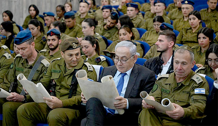 PM Netanyahu reads Purim Megillah with troops, sends message to Sinwar